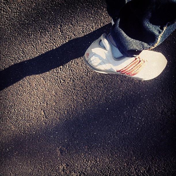 Walking Photograph - #walking #adidas #sneakers #road #shadow by Katie Ball