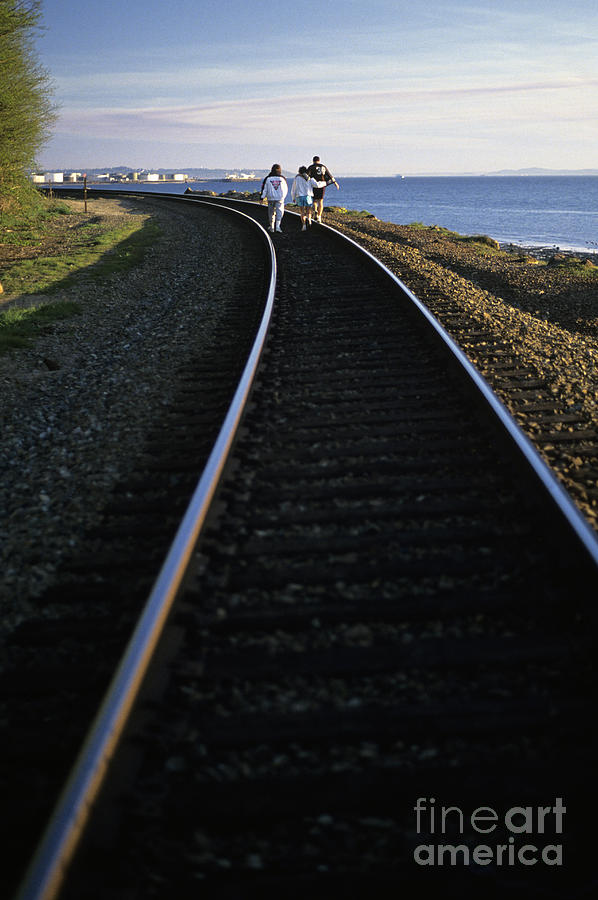 Walking Along The Tracks Photograph by Jim Corwin