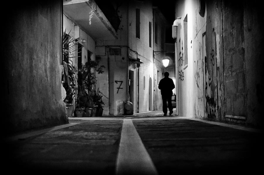 Walking away Photograph by Spyros Papaspyropoulos - Fine Art America