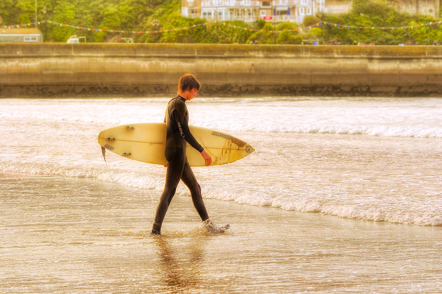 Walking Into The Sea - Surfer at Newquay Photograph by Mark Tisdale