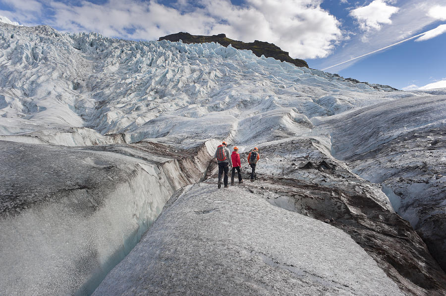 Walking On A Glacier Photograph by Subtik