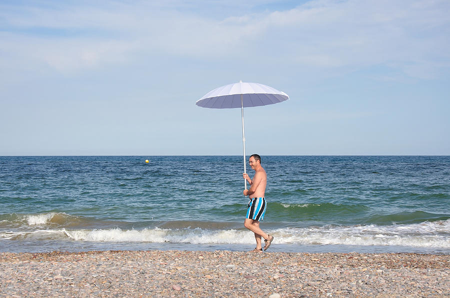 Walking On The Beach Photograph by Miguel Sotomayor Walking On The Beach Photograph by Miguel Sotomayor