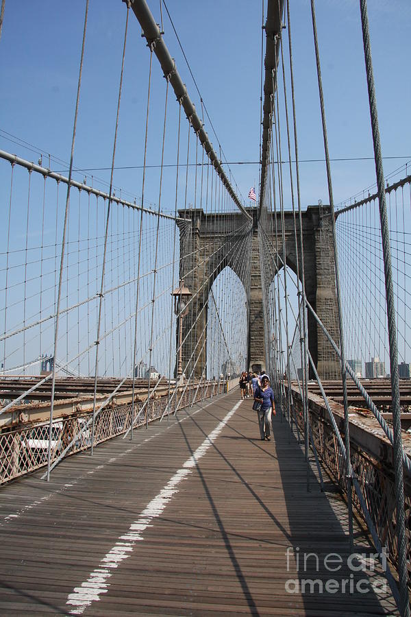 Brooklyn Bridge Photograph - Walking The Bridge by Christiane Schulze Art And Photography