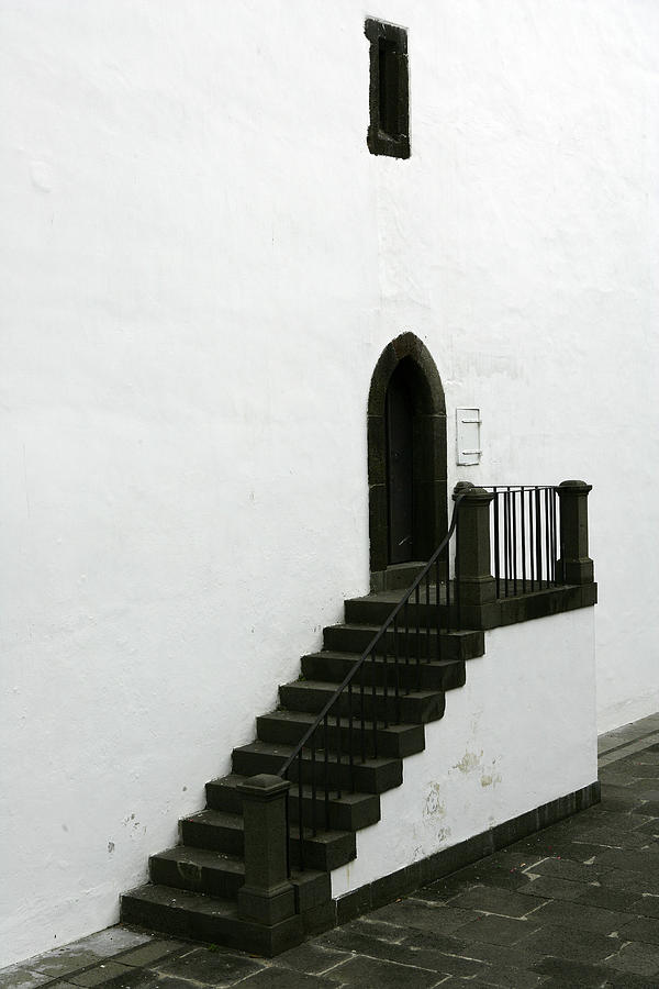 Wall With Black Door And Staircase In Photograph by David Santiago Garcia / Aurora Photos