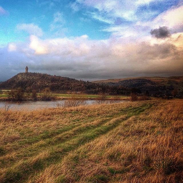 Nature Photograph - Wallace Monument In The Distance by Colin Logie