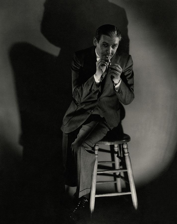 Walter Winchell Lighting A Cigarette Photograph by Edward Steichen