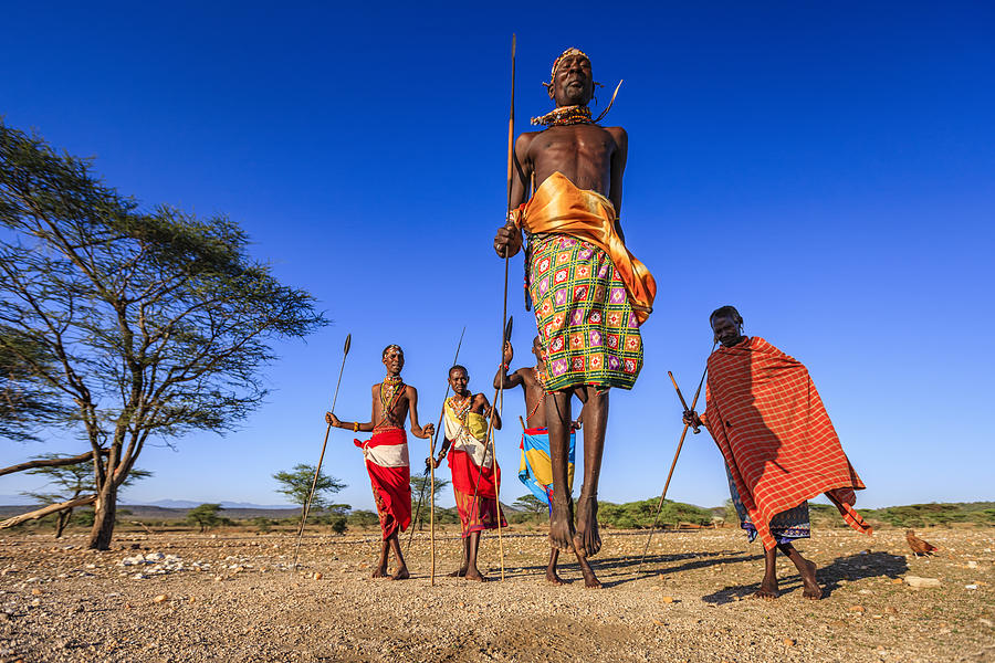 Warrior from Samburu tribe performing traditional jumping dance, Kenya, Africa Photograph by Bartosz Hadyniak