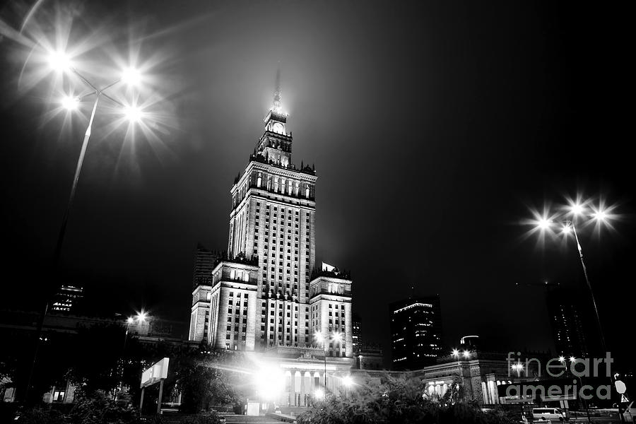 Warsaw Poland downtown skyline at night Photograph by Michal Bednarek