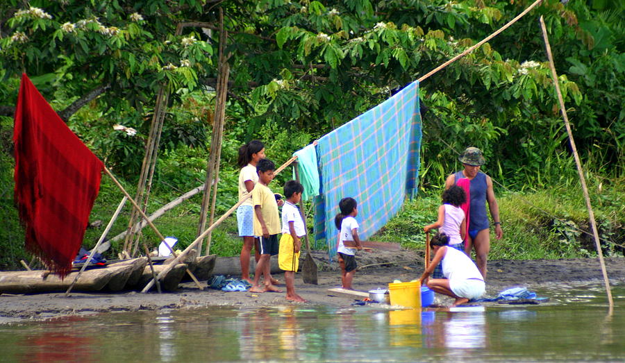 Washing Clothes in the Tiputini River Photograph by Laurel Talabere ...