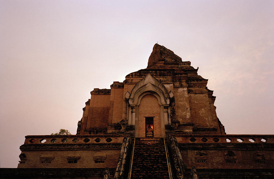 Wat Chedi Luang Sunset In Thailand Photograph by Shaun Higson