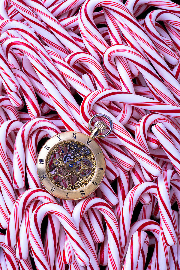 Watch and candy canes Photograph by Garry Gay