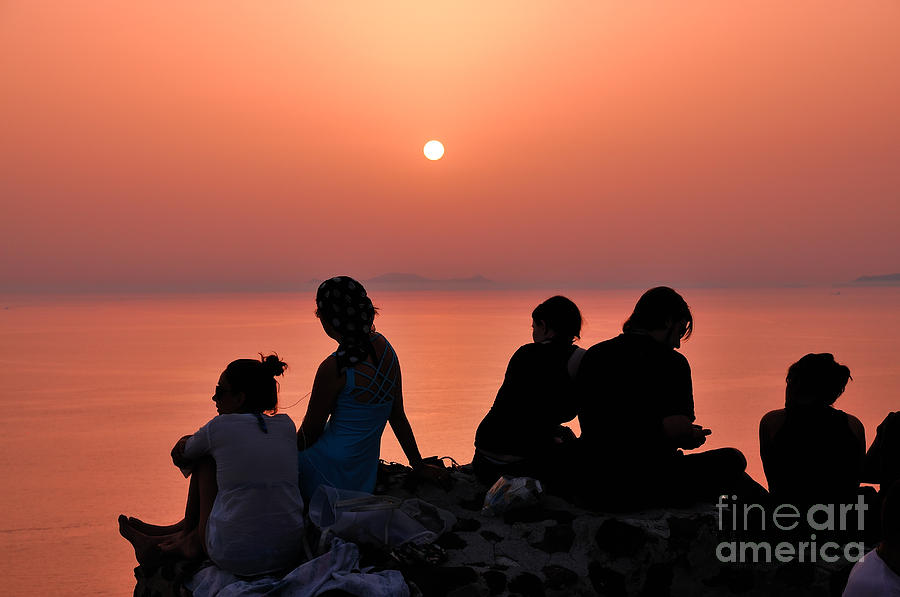 Watching the famous sunset in Oia Photograph by George Atsametakis