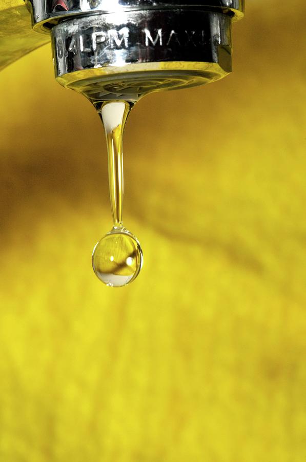 Water Dripping From A Tap Photograph by Photostock-israel/science Photo Library