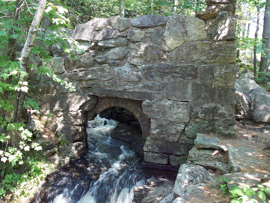 Water Flow under Stone Wall Photograph by Catherine Gagne