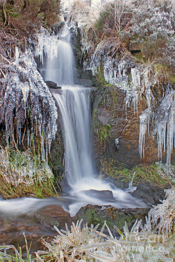 Waterfall and ice Photograph by David Birchall