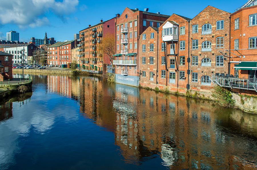 Waterfront buildings along Aire river, Leeds, England, UK Photograph by Jasonmgabriel