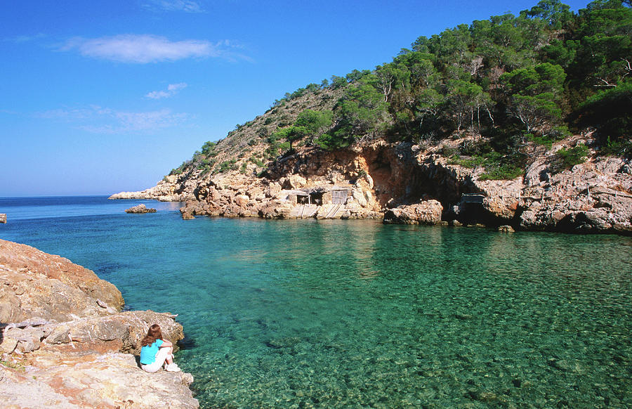 Waters Of Cala Xucla With Girl On Rocks Photograph by David C Tomlinson