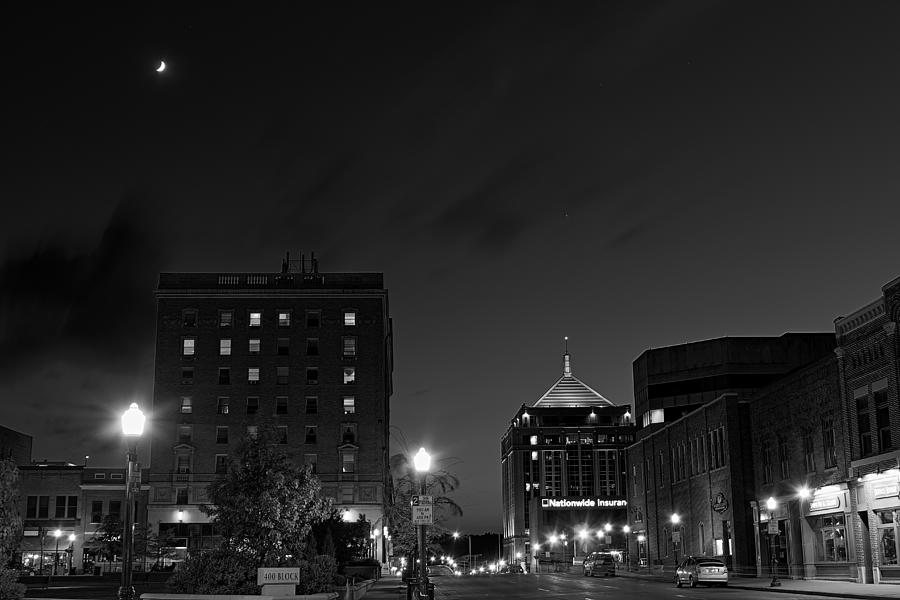 Wausau After Dark with the Crescent Moon Looking On Photograph by Dale Kauzlaric