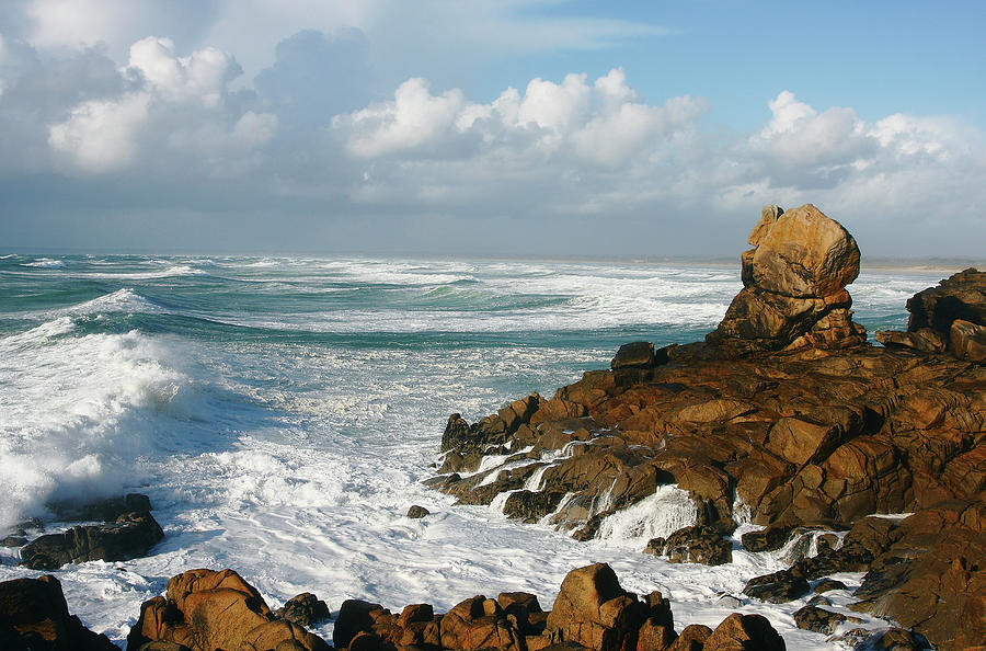 Wave About To Crash Against Rocks Photograph by Stuart Paton