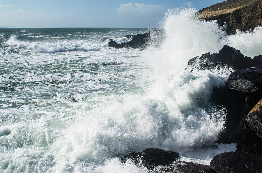 Waves Breaking Over The Rocky Shore Of Photograph by James Sparshatt / Design Pics