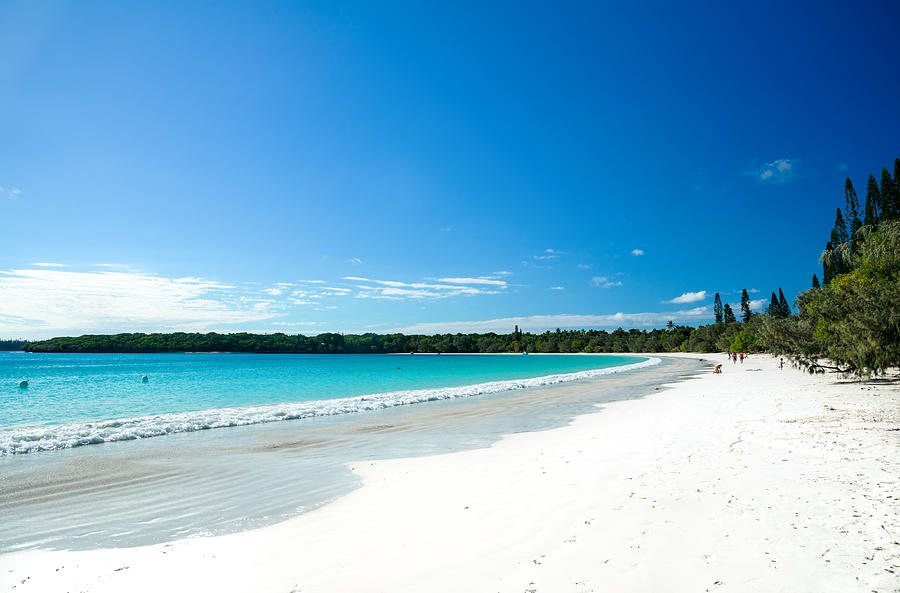 Beach Photograph - Waves lapping against white sandy beach - Kuto Bay - Isle of Pines - New Caledonia by David Hill