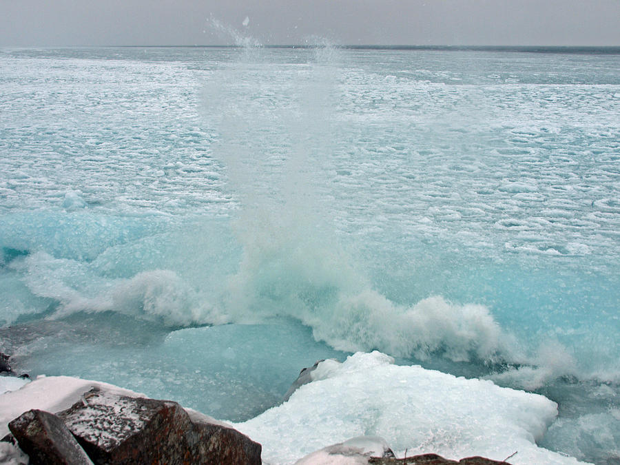 Waves of Pancake Ice Crashing Ashore Photograph by James Peterson