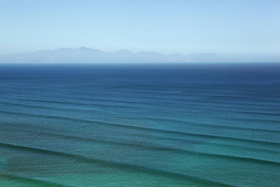 Waves Rippling On Calm Ocean Waters By Image Source