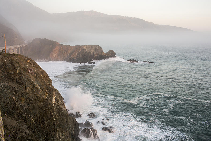 Waves splashing on rocks at cliffs Photograph by Adam Hester