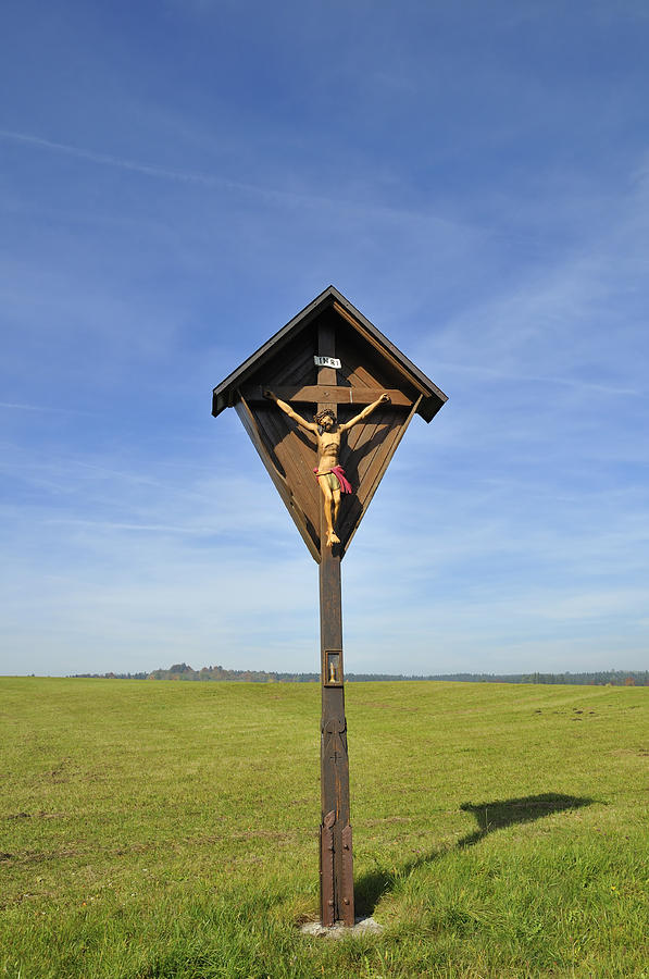 Wayside crucifix green meadow and blue sky Photograph by Matthias Hauser
