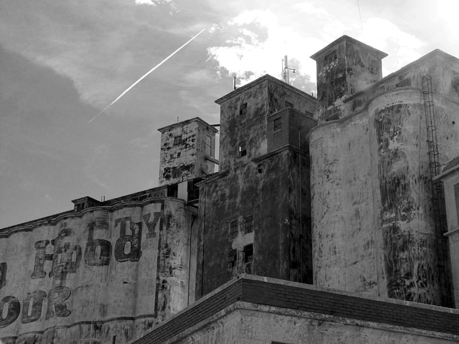 Black And White Photograph - Weathered and Abandoned Grain Elevator by Ann Powell