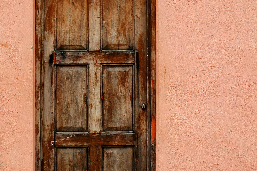 Weathered Door on Peach Stucco Photograph by Rob Huntley