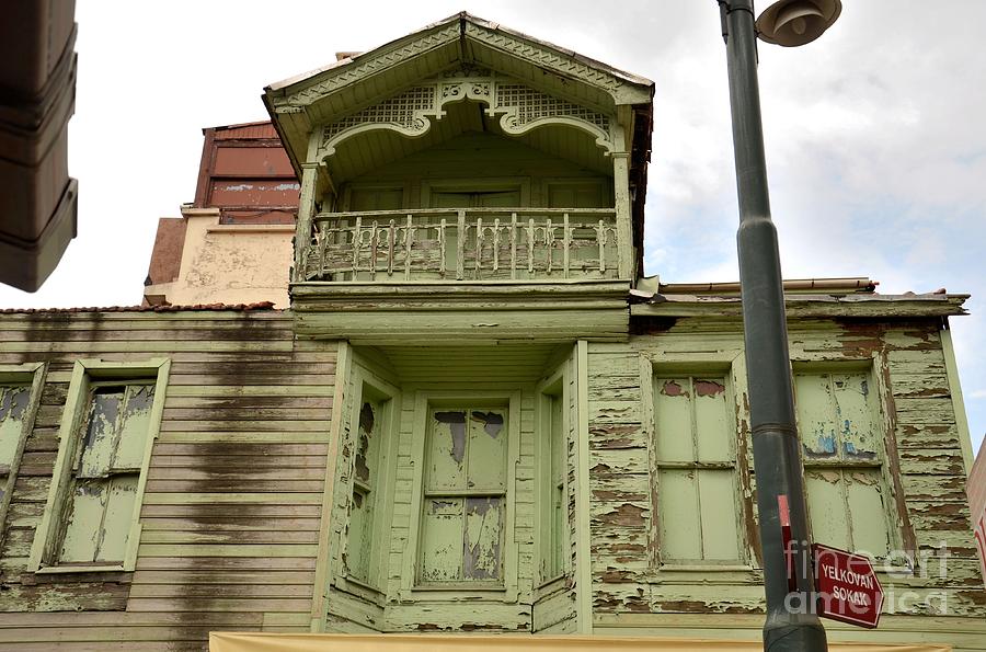 Weathered old green wooden house Photograph by Imran Ahmed