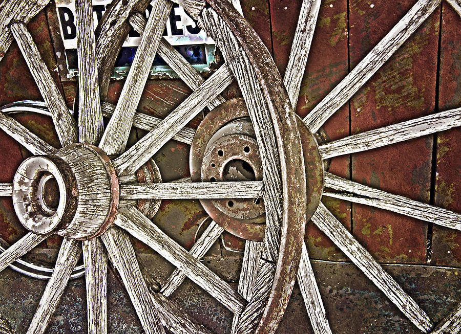 Weathered Wagon Wheel Photograph by Judy Hall-Folde