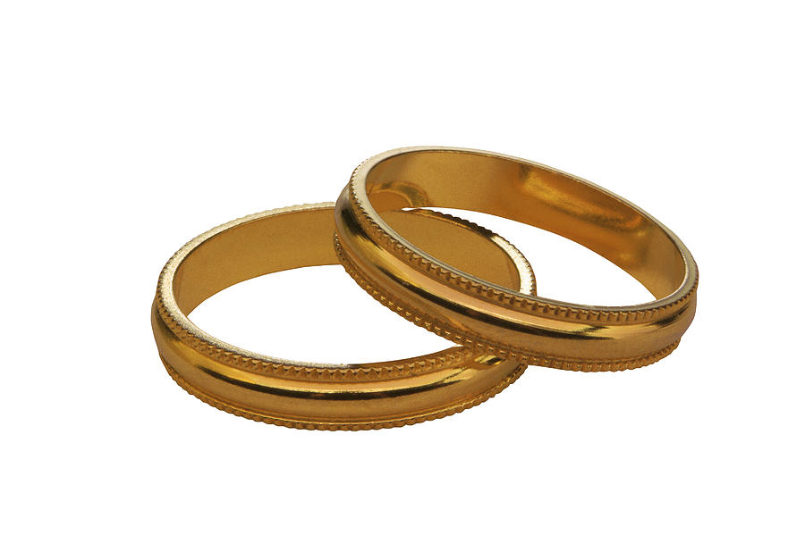 Wedding bands Photograph by Comstock