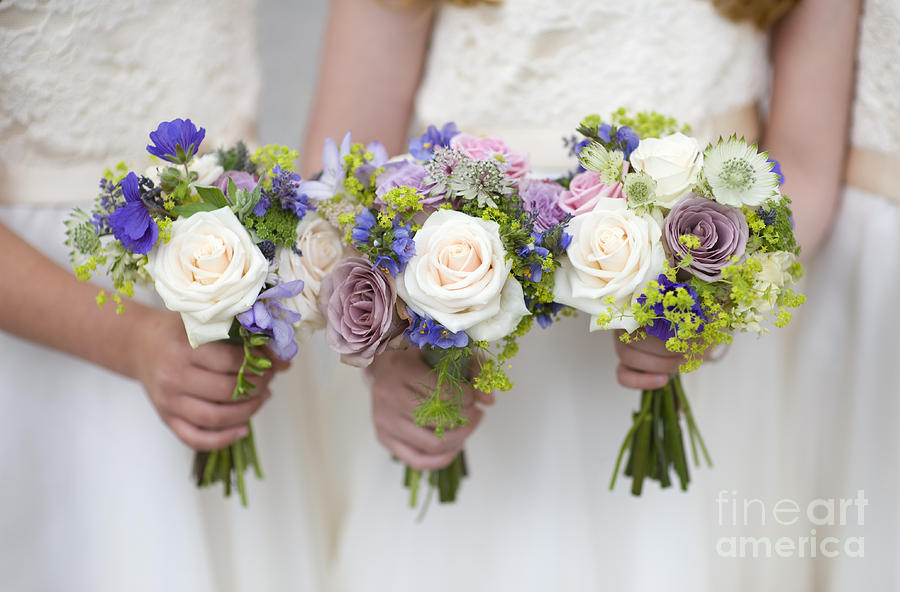 Wedding Bouquets Held By Bridesmaids Photograph by Lee Avison