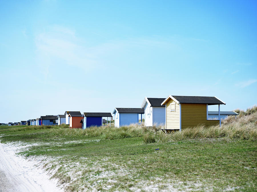 Weekend Cottages On Beach Photograph by Johner Images