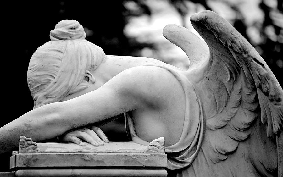 crying baby angel statue