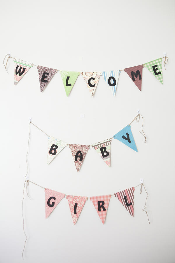 Welcome Baby Girl sign on wall Photograph by Shestock