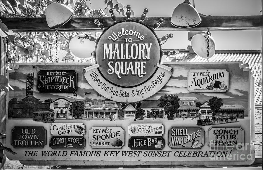 Black And White Photograph - Welcome to Mallory Square Key West - Black and White by Ian Monk