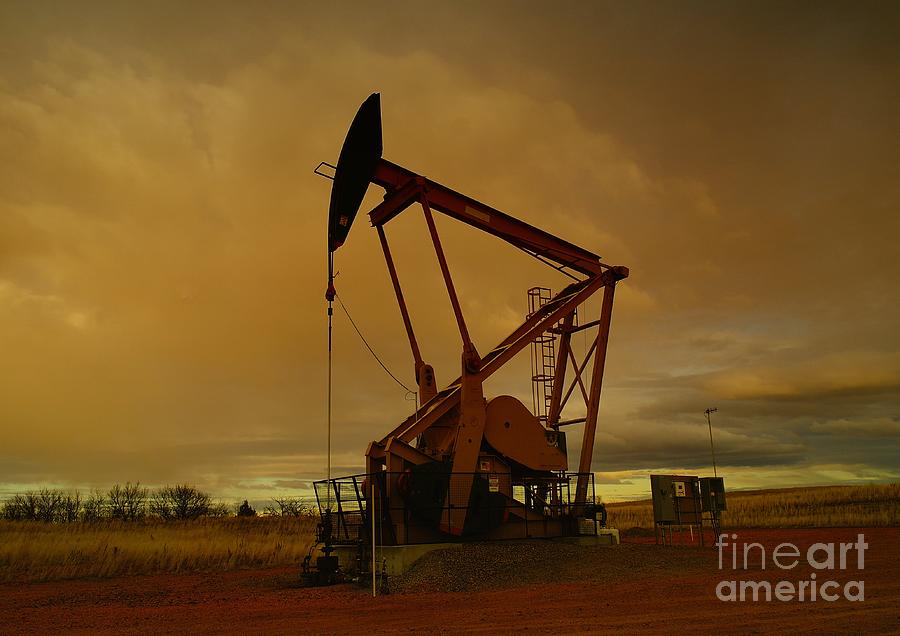 Oil Photograph - Wellhead At Dusk by Jeff Swan
