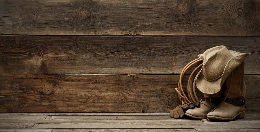 Western barnwood background w/boots,hat,lasso-extra wide Photograph by GaryAlvis