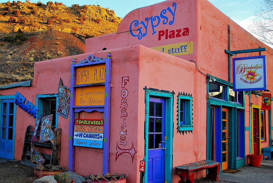 Color Photograph - Western Town Shops by Kelly Mac Neill