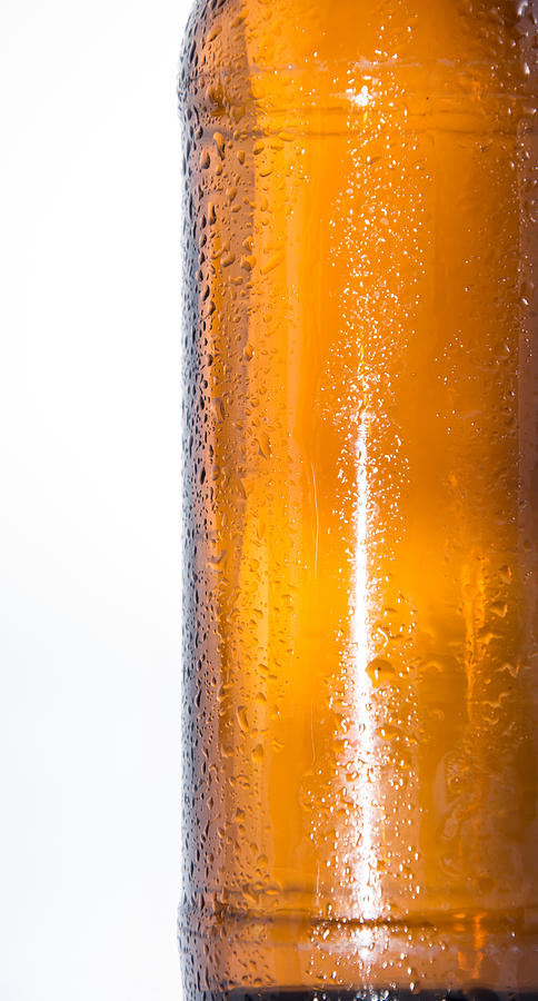 Beer Photograph - Wet bottle of Beer on white by Handmade Pictures