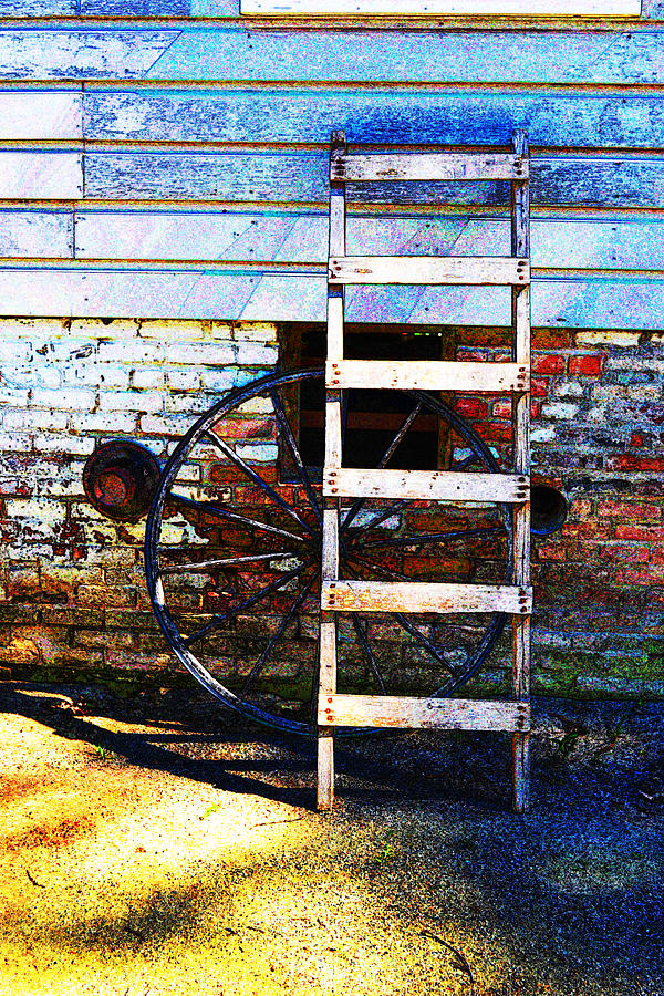 Wheel and Ladder Photograph by Holly Blunkall