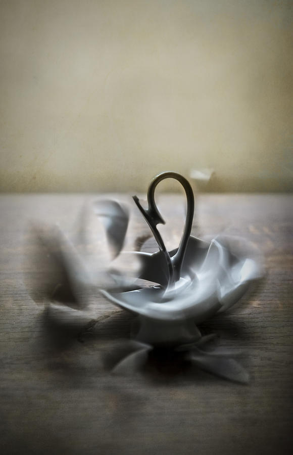 When the teacup breaks Photograph by Jaroslaw Blaminsky