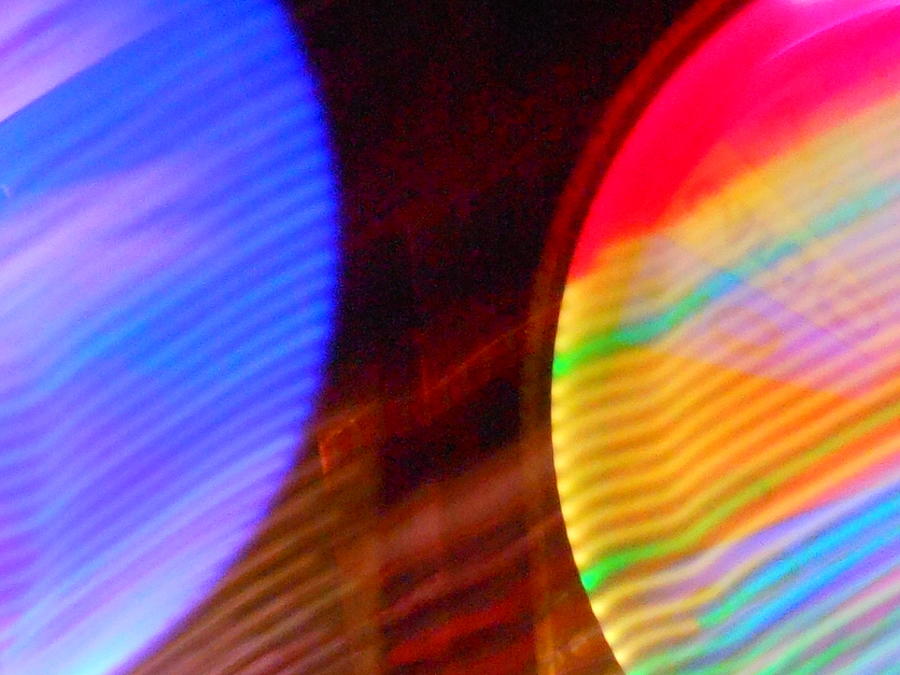 Abstract Photograph - When Worlds Collide by James Welch