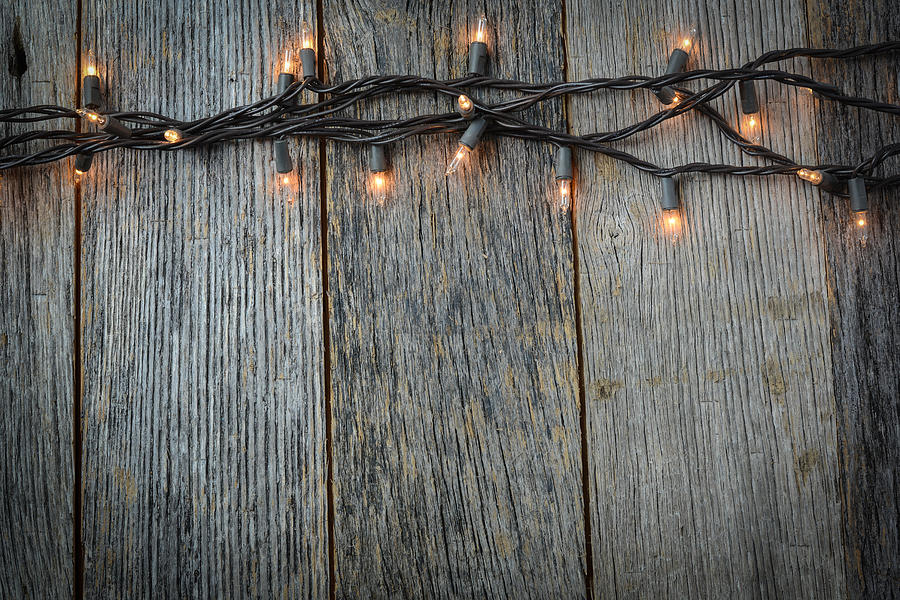 Whiite Christmas Tree Lights with Rustic Wood Background Photograph by Brandon Bourdages