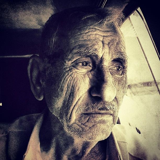 Irak Photograph - While I Was Sitting In The Microbus by Nawar Al-ani