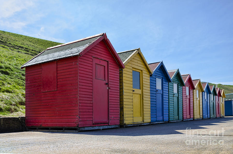 Whitby beach huts Photograph by Steev Stamford