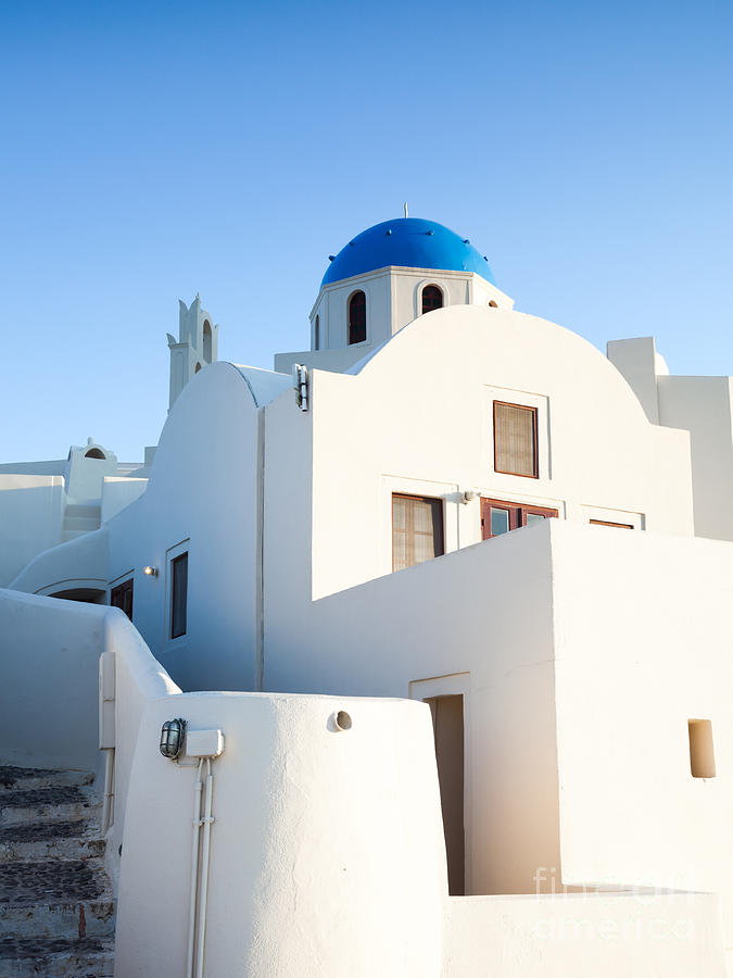White buildings and blue church in Oia Santorini Greece Photograph by Matteo Colombo